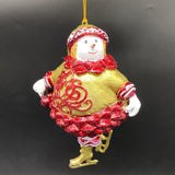 Julepynt - snemand/dame på skøjter i rød eller hvid